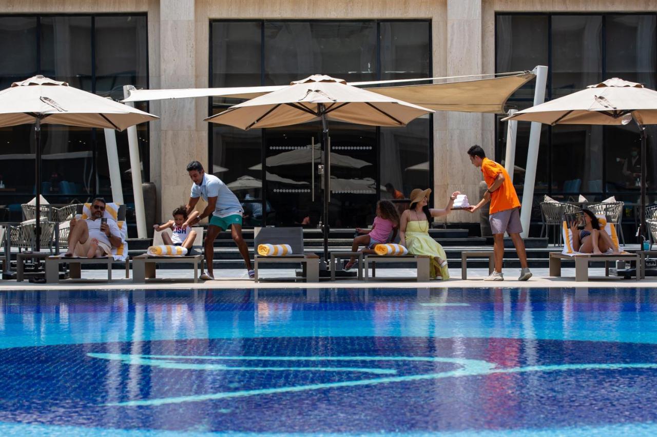 Triumph Luxury Hotel Kairo Exterior foto The pool at the Ritz-Carlton, Dubai