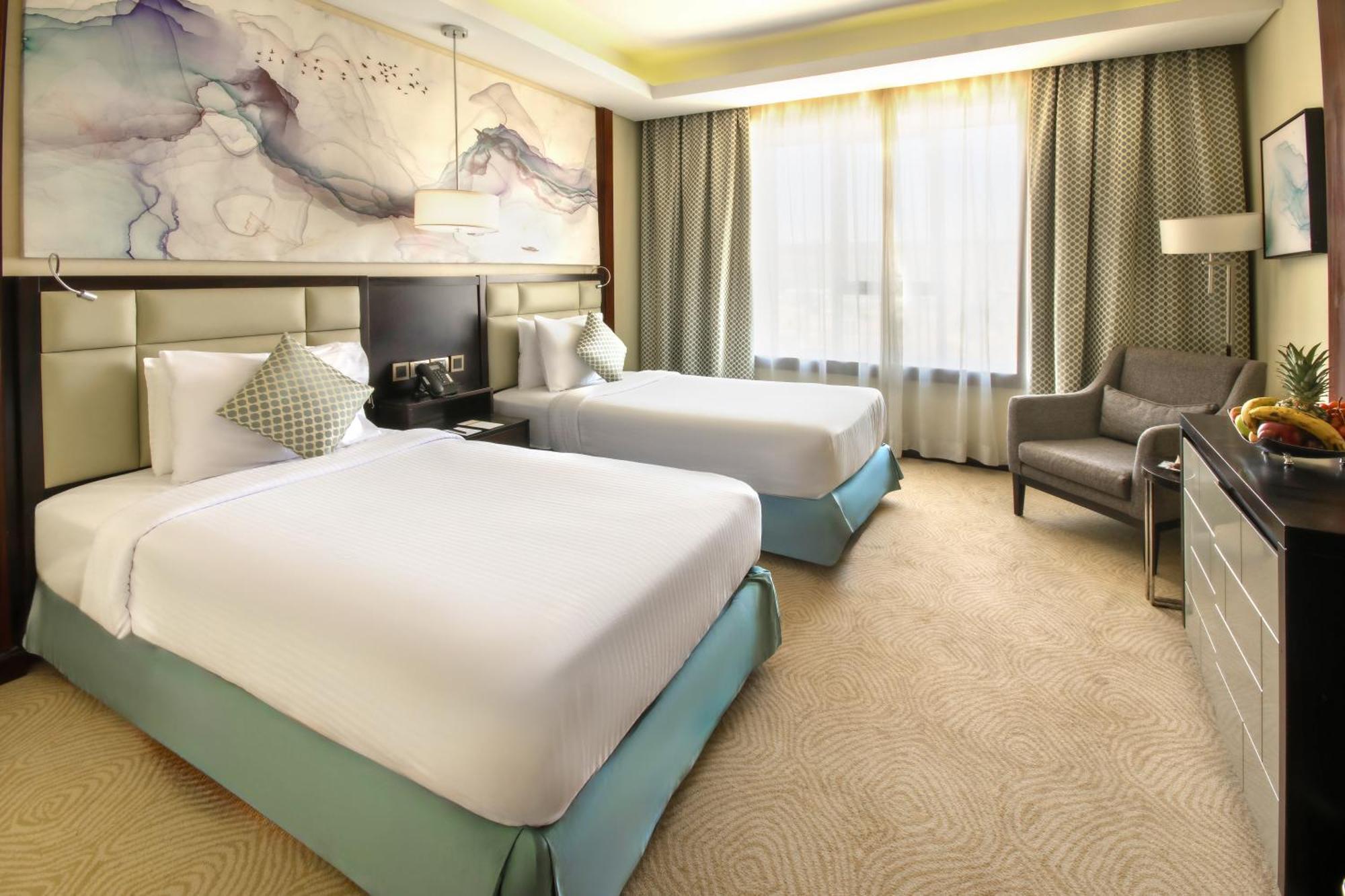 Triumph Luxury Hotel Kairo Zimmer foto Deluxe Room