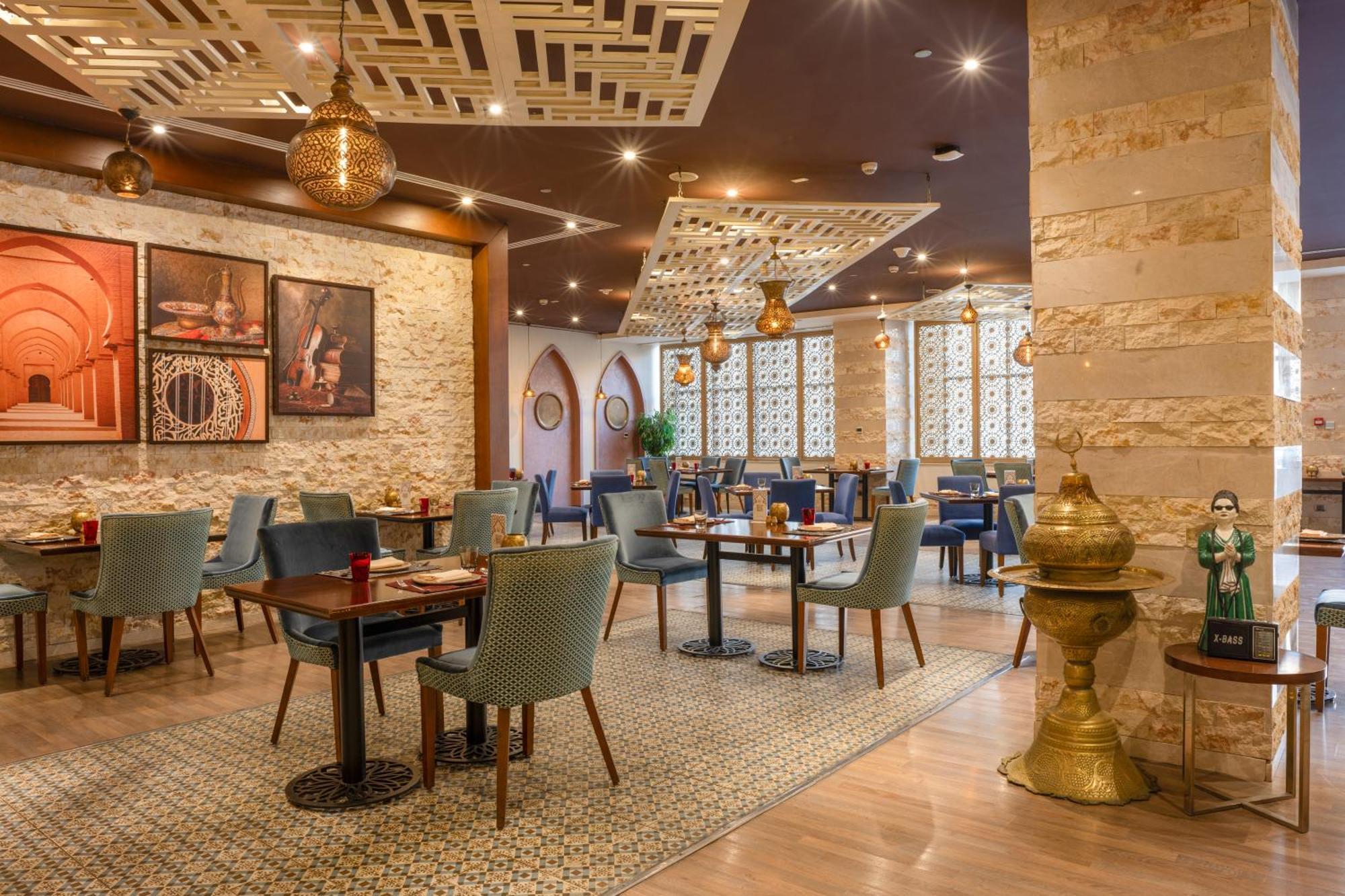Triumph Luxury Hotel Kairo Exterior foto Restaurant